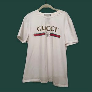 Authentic Gucci Oversize T-shirt - Embroidered Flower on back - Great condition